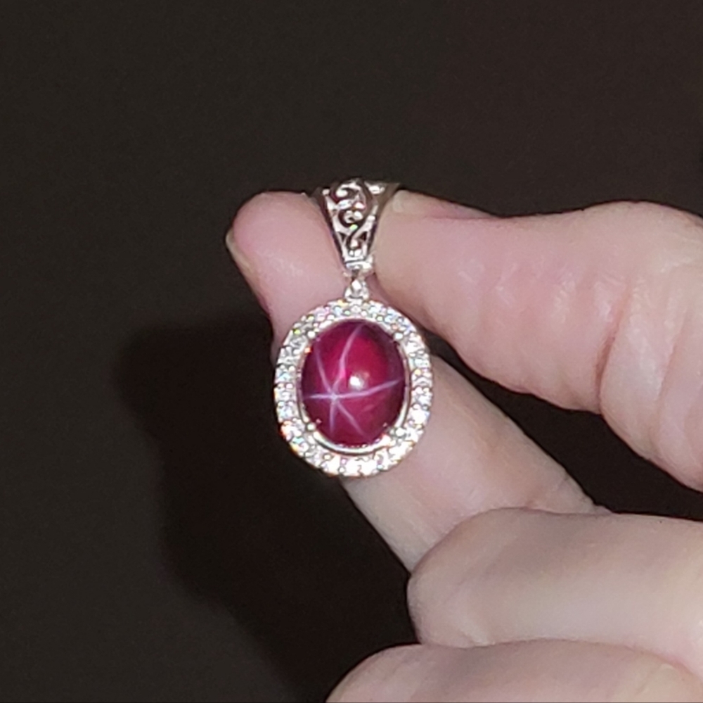 Stamped! 925 10x12mm red star ruby pendant in a halo setting